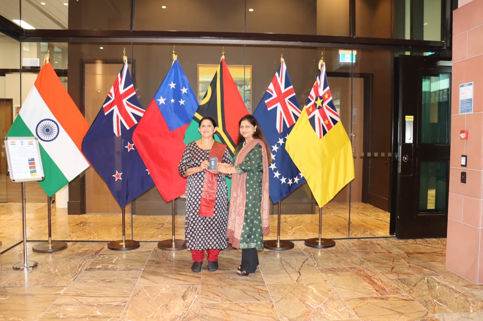 HC Neeta Bhushan handed over the first Indian e-Passport in Wellington.